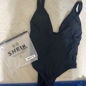 NEVER WORN Deep V one piece bathing suit never worn